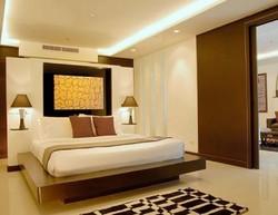 Comfortable-bedroom-modern-hotel-with-asian-style-interior-design_thumb